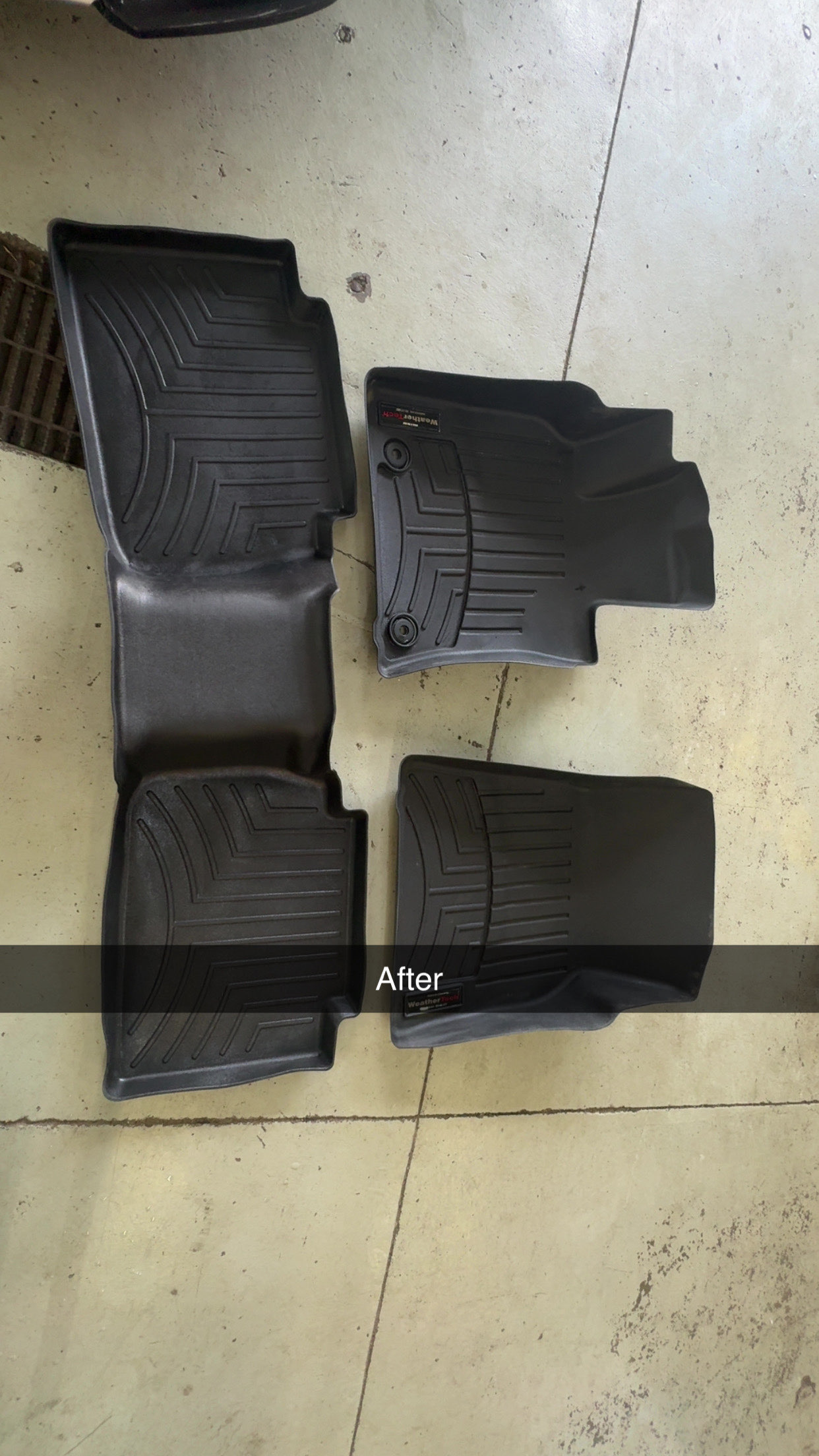 Clean, black WeatherTech floor mats after detailing