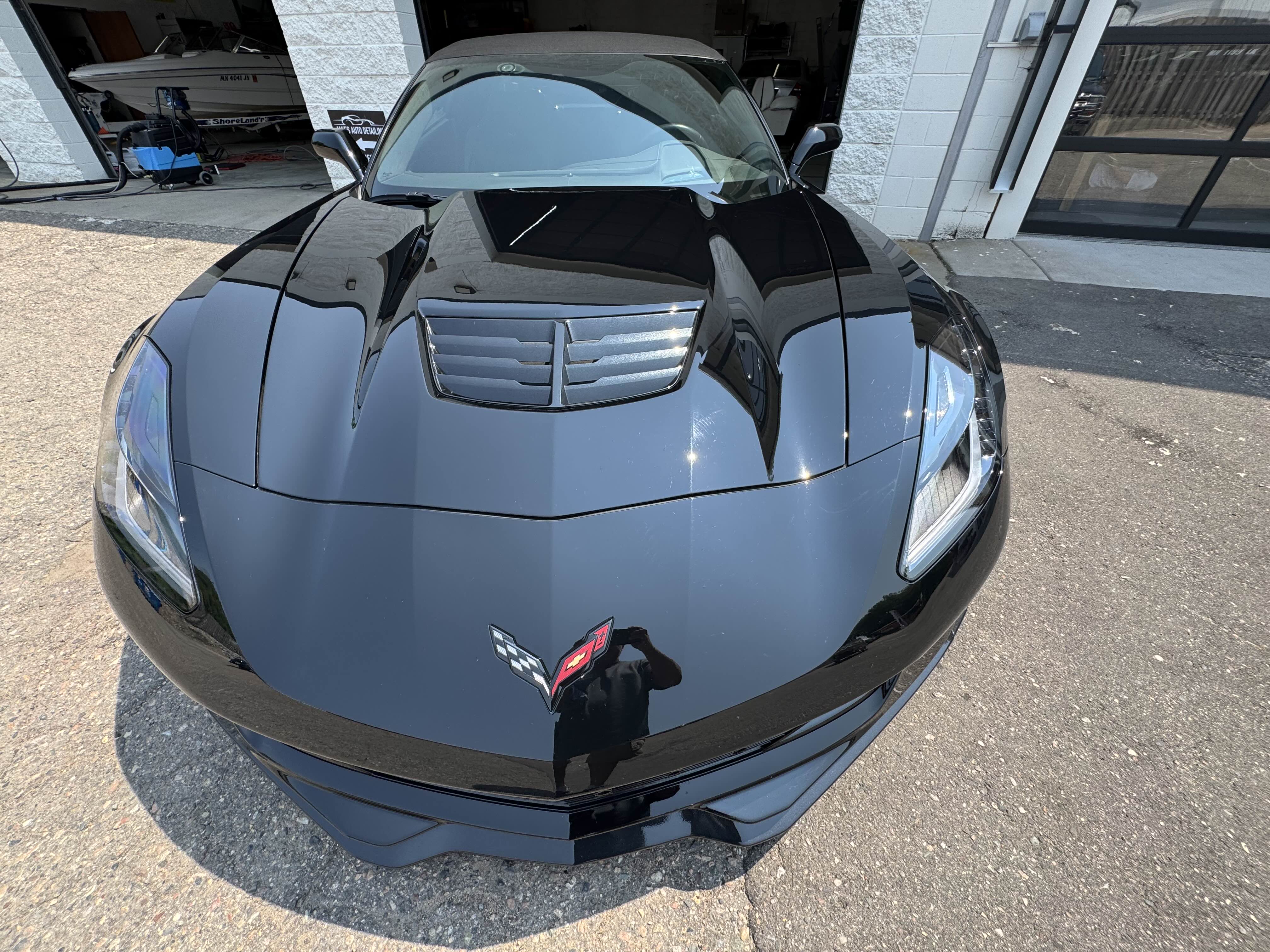 Polished black Chevrolet Corvette front view